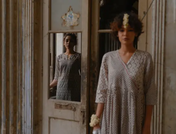 Two models in a photoshoot at an old palace